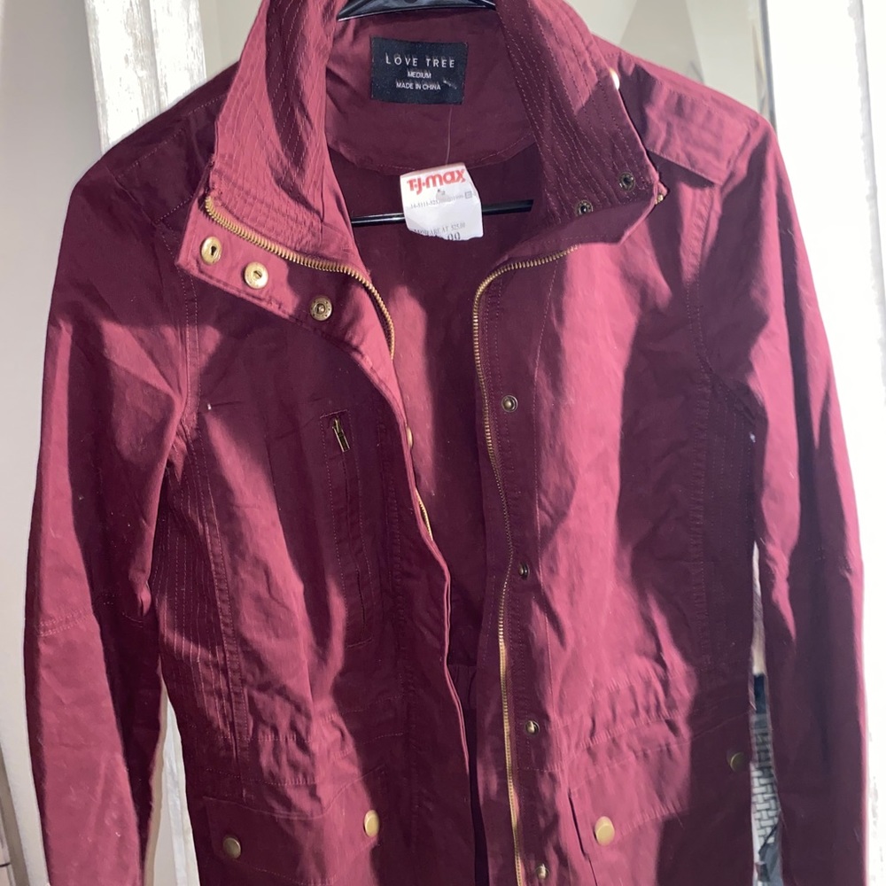 Light maroon jacket.